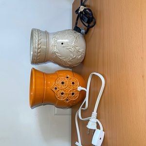 Joy Mangano Forever Fragrant Tart Warmer Wax Melter and another candle warmer.